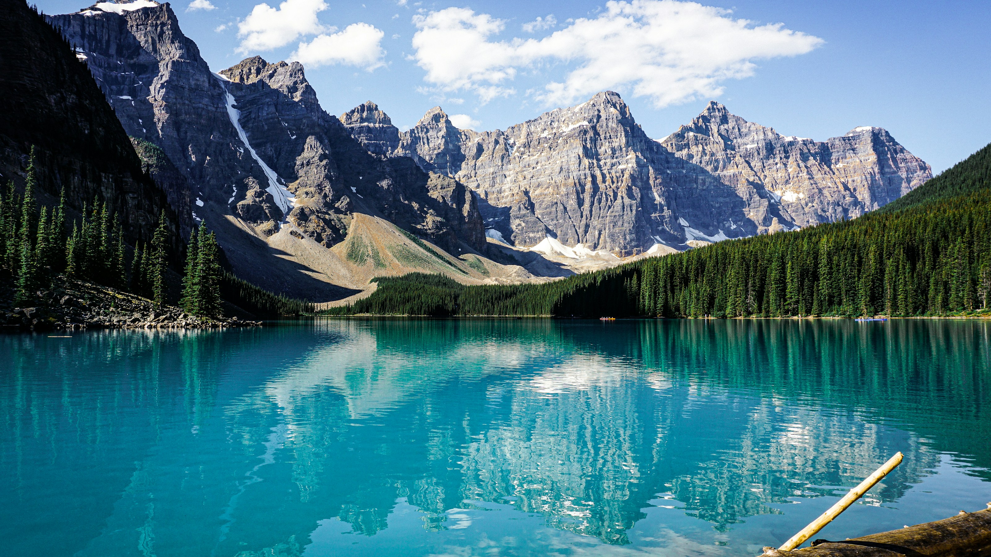 Mountains and clear water representing travel and varied operational environments